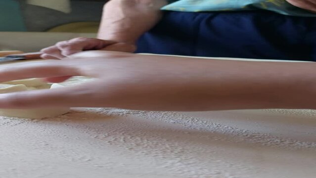 Traditional Buryad Buuz making process. Steamed dumpling filled with meat