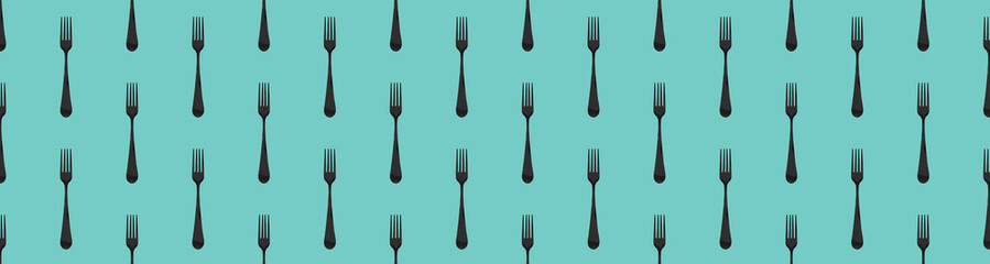 pattern. Fork top view on pastel green blue background. Template for applying to surface. Banner for insertion into site. Flat lay. 3D image. 3D rendering.