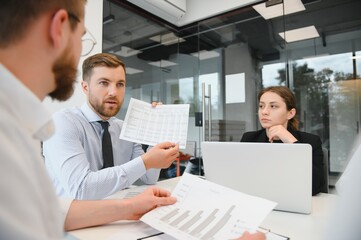 Business people working on project in office