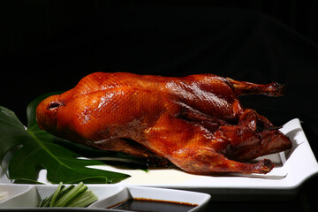 Famous food in Beijing, China, Peking duck, duck roasted with fruit wood