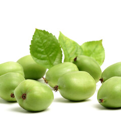 mini kiwi baby fruit (actinidia arguta) on white background 