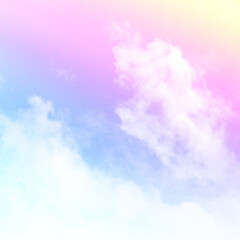 Obraz na płótnie Canvas Colorful sky with soft white clouds and the crossing of rainbows. pastel colored magical fantasy background. Sweet Dreams concept for Wallpaper, Backdrops and Design.