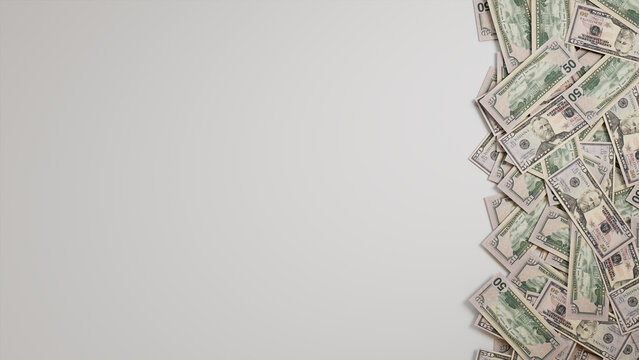 Fifty Dollar Bills Border on White Surface. Savings Wallpaper with copy-space.