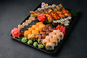 Sushi set on the black plate