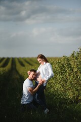 Fototapeta premium Portrait of lovely future parents during sunset