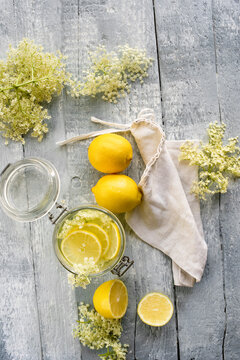 Studio shot of elderflower syrup in mason jar