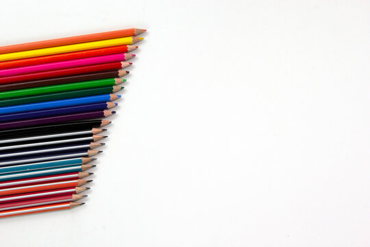 SET of Color pencils on white backgroup. used in Back to school concept for Modern design. Top view of multi color pencils isolated on white background