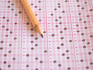 optical pink form of an examination with pencil, close up, noise effect,
