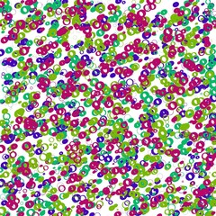 Red, green and blue rings on the white background. Chaotic pattern.