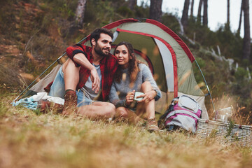 Couple camping in the forest