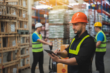 Man portrait happy professional warehouse worker check box stock good package in store worker safety