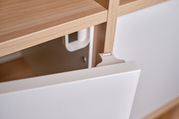 Magnetic child-proof lock for locking cabinet doors and drawers of home furniture