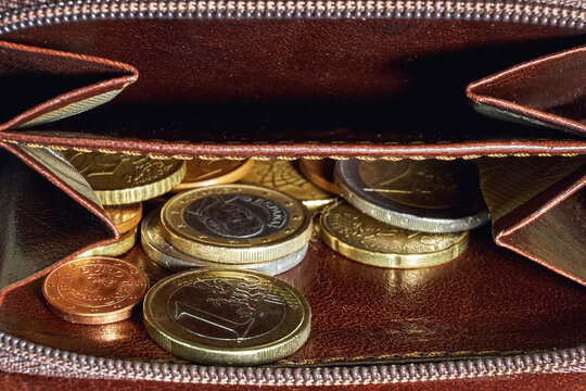 Euros money in a wallet close-up, coins rubles and kopecks from Europe