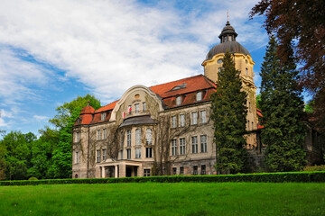 Fototapeta na wymiar Palace of von Fischer-Lossainen build between 1909 - 1911. Lezany, Warmian-Masurian Voivodeship, Poland.
