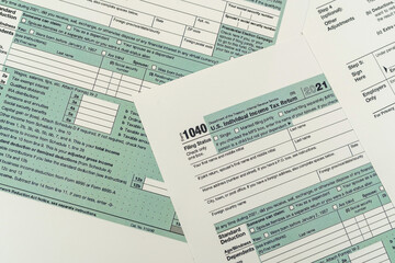empty 1040 individual tax form ready to fill in office desk