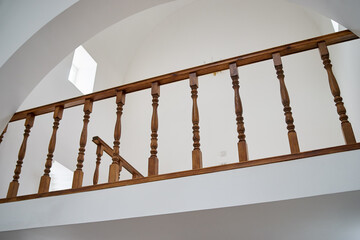 Wooden railing on the 2nd floor of the church