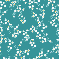 Simple vintage pattern. Small white flowers, light blue leaves. blue background. Fashionable print for textiles and wallpaper.