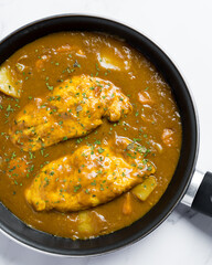 Recipe with japanese curry and chicken in a pan