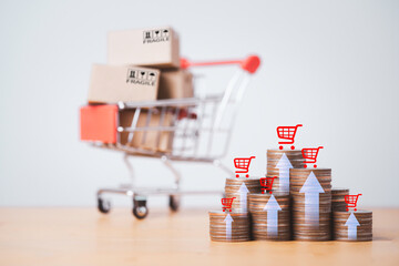 Coins stacking with up arrow and shopping cart trolley icon for sale business investment growth and...