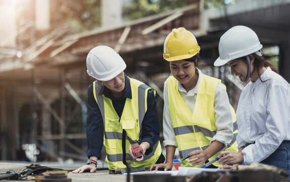 Three Experts Inspect Commercial Building Construction Sites, Industrial Buildings Real Estate Projects With Civil Engineers, Investors Use Laptops In Background Home, Concrete Formwork Framing.