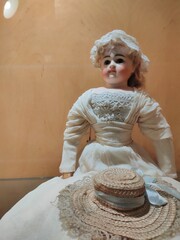 Doll in a white dress