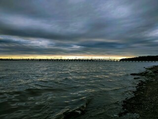 sunset over the sea and pier