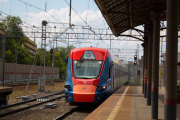 EG2Tv-002 on Rabochiy Poselok(Working settlement) station. EG2Tv (Electric train urban 2nd type Tverskoy) the newest electric train of TVZ, using for urban transportations, and in project MCD