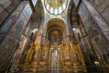 Interior of the St. Sophia Cathedral with mosaic Orans of Kyiv, frescoes on the wall and the golden...
