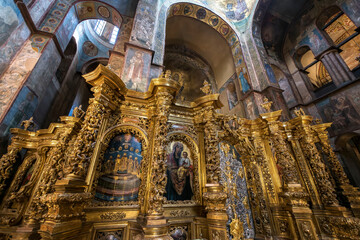 Interior of the St. Sophia Cathedral with mosaic Orans of Kyiv, frescoes on the wall and the golden altar. Kyiv, Ukraine
