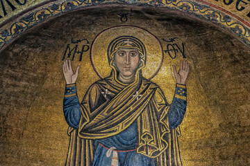 Naklejka premium Interior of the St. Sophia Cathedral with mosaic Orans of Kyiv, frescoes on the wall and the golden altar. Kyiv, Ukraine