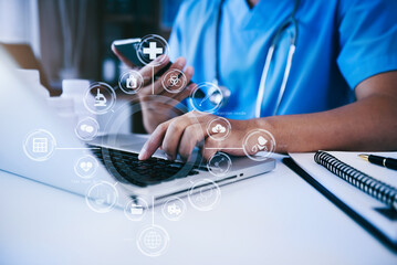 Medical Technology Concepts. Medical students use mobile phones to search for information in a...