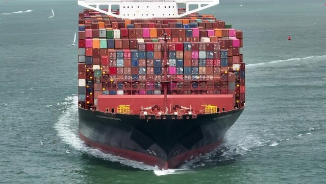 Ship Carrying Thousands of Containers Transporting International Cargo
