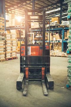 forklift, Shelves and racks with pallets in distribution warehouse interior