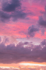 Sunset in the sky that is lighting up clouds