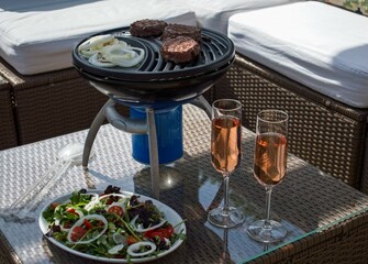 Camping gas barbecue, portable stove. Compact bbq for outdoor alfresco cooking. Camping party...