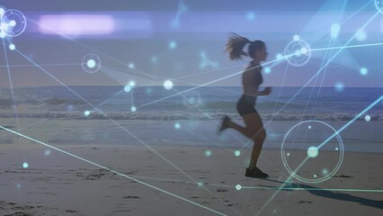 Animation of network lines connecting dots against young caucasian woman running at beach - Powered by Adobe