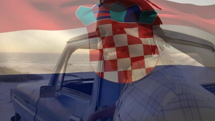 Animation of croatia flag waving over portrait of african american man standing by pick-up truck - Powered by Adobe