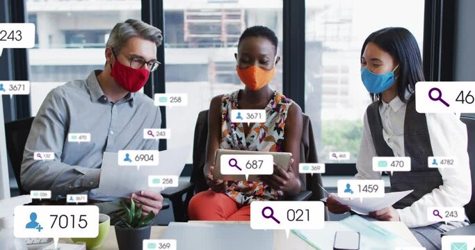 Animation of social media icons over diverse business people in face masks