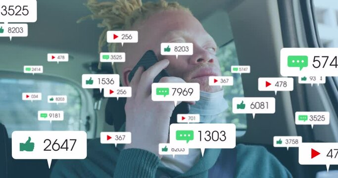 Animation of social media icons over albino man with face mask using smartphone
