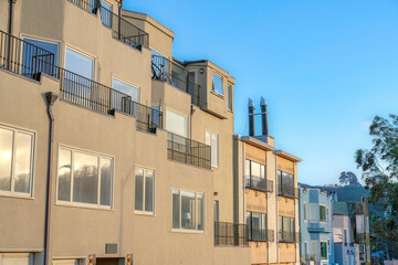 Side-view of an apartment building along with the townhouses in San Francisco, California