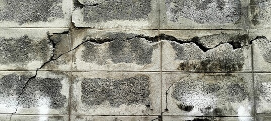 Cement cinder block cracked.
