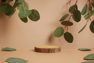 Wood podium with green leaves and natural stones. Abstract podium for organic cosmetic products. Natural stand for presentation and exhibitions.