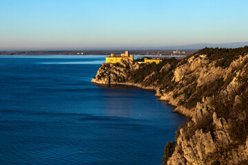 Devin - Duino Castle on Adriatic Sea Coast in First Morning Lights of Winter