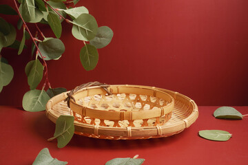 Minimal modern product display on neutral beige background. Wood slice podium and green leaves. Concept scene stage showcase for new product, promotion sale, banner, presentation