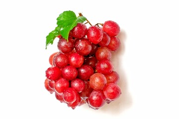 Wet red grapes drops isolated on white background.