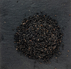 chia seeds on a black stone stand