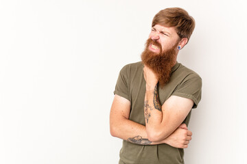 Young caucasian red-haired man isolated on white background touching back of head, thinking and...