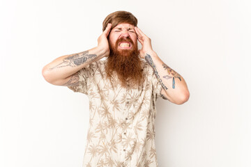 Young caucasian red-haired man isolated on white background touching temples and having headache.