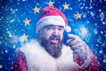 Isolate. Cold weather. Bask. A man in a fur hat and scarf warms his hands with his mouth. It's...