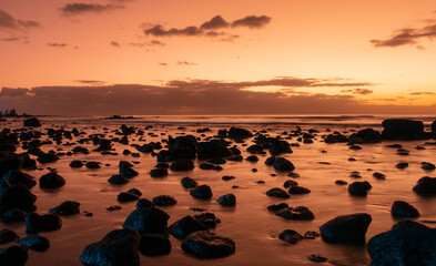 Sunset over the indian ocean in Mauritius Trou aux biches with afterglow